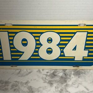 Vintage 1984 Blue and Yellow License Plate